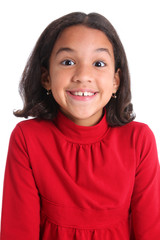 Young Girl Posing Against A White Background