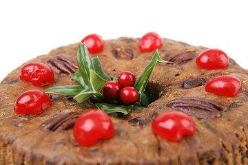 Closeup of moist, delicious Christmas cake with cherries