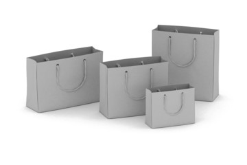 Blank, white gift bags over white background