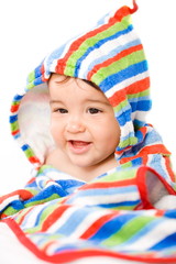 Portrait of happy 8 months old Baby girl in vivid colors.