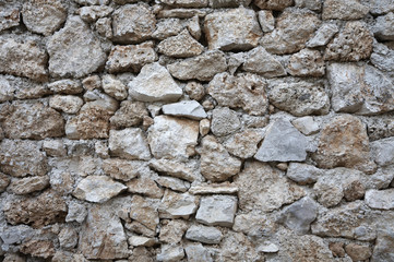 Detail shot of an old stone wall.