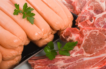 Raw Lamb chops and Beef Sausages