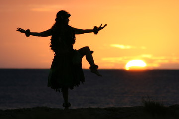 Hula dancer in  the sunset
