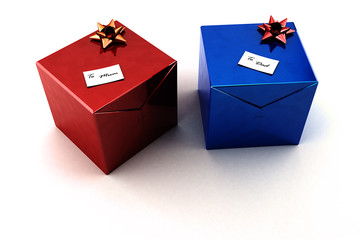 Christmas gifts for mum and dad over white background