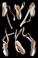 brand new ballet shoes on a black background