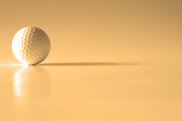 Closeup of golfball with dark shadows