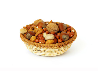 Fototapeta na wymiar Basket of nuts isolated on white background