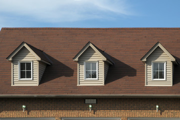 Three windows in the attic