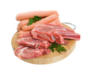 Raw Lamb chops and Beef Sausages Isolated over white background