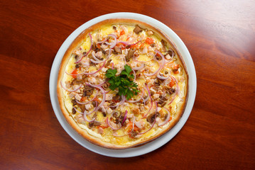 Tasty Italian pizza  on plate.Italian kitchen