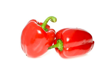 Two red sweet peppers isolated on the white background