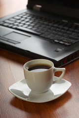 Bussiness theme with laptop and coffee.