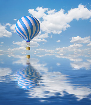 Blue-white Hot Air Balloon in the sky
