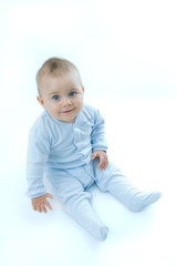 portrait of a cute, smiling baby boy on white