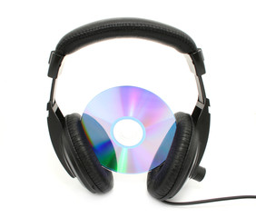 headphones and disc isolated on white