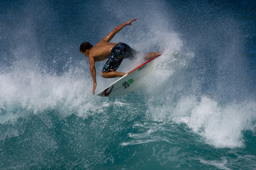 surfer doing backside ariel