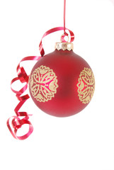 Red Christmas ornament with red ribbon isolated on white