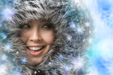 Creative photo of laughing woman framed by snowflakes