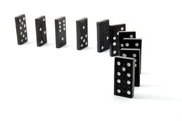 chain of dominoes isolated on a white background