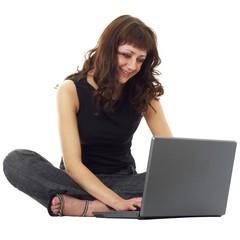 Naklejka premium charming student with laptop on a white background