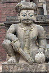 Fototapeta na wymiar Statue Guarding the Steps to a Hindu Temple