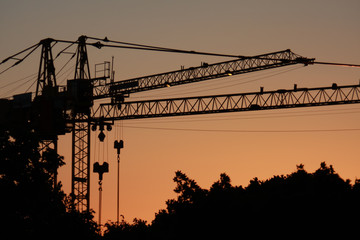 hoisting crane.silhouette sunset