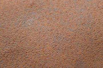 brown rusty surface with bulges