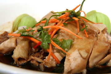 Chicken cooked in soy sauce for Hainanese chicken rice.