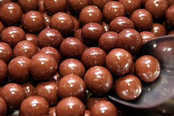 details of many chocolate candy in close up