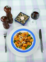 Roasted pumpkin and onion salad with wilted spinach