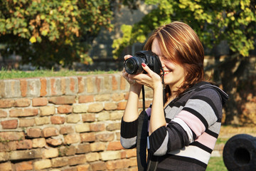 brunette with camera
