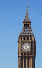 london's big ben clock tower striking noon