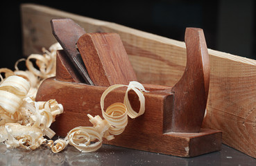 shaving and wooden plane,focus on a foreground