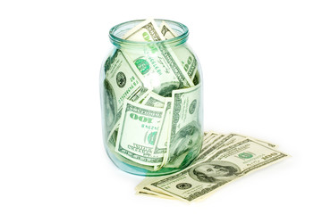 business concept. money in the jar isolated on white