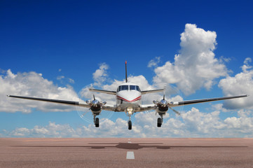 Corporte aircraft landing or taking off during a sunny day