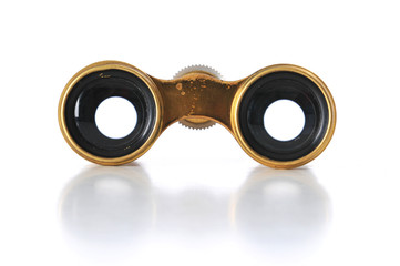 Vintage Binoculars in frontal view with reflection