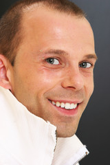 Obraz premium young man close up isolated in black