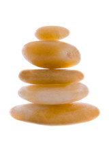 Fototapeta na wymiar Stones of various sizes in balance on a over white background