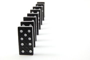 chain of dominoes isolated on a white background