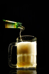 Glass of beer  and bottle