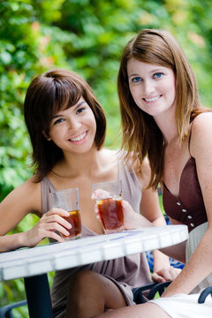 Two Young Attractive Women Having Lunch Together Outside