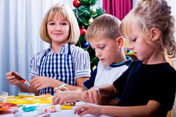 Fototapeta premium kids baking christmas cookies 2