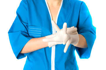 doctor who is putting on gloves
