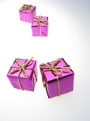 usual gift boxes of violet color on  white background