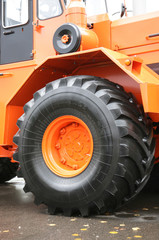 wheeled tractor of high-powered of orange color