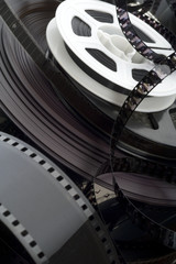 closeup of a scrambled film reels and strips