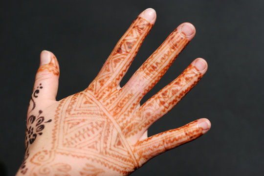 A hand painted with Henna