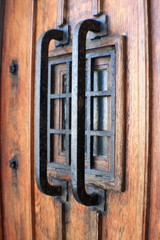 oeil-de-boeuf porte fer forgé