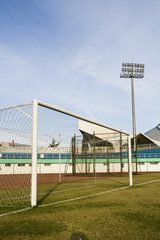 Fototapeta premium Piłka nożna bramka na pustym stadionie piłkarskim