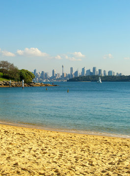 View from the beach with the Sydney skyline in the back